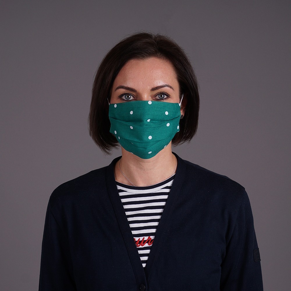 Green linen reusable mask with white dots
