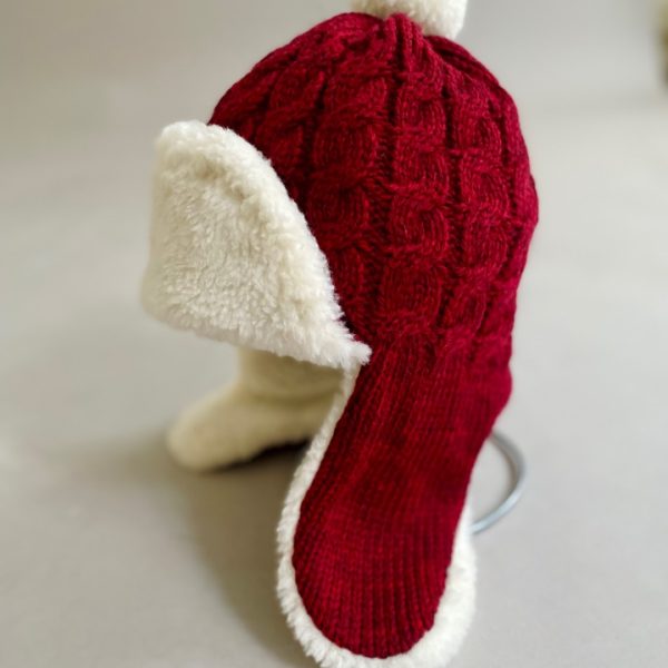 Tresse шапка-ушанка из шерсти мериноса бордового цвета